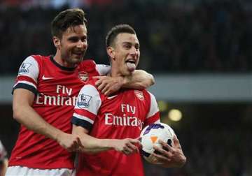 arsenal beats newcastle 3 0 to cement fourth spot