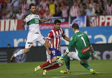 atletico madrid extends liga lead before chelsea cl match