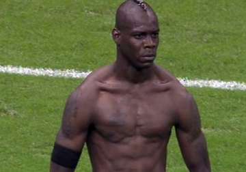 balotelli out of italy squad with conjunctivitis