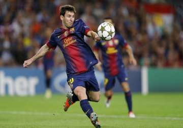 barca s coach happy with messi s form