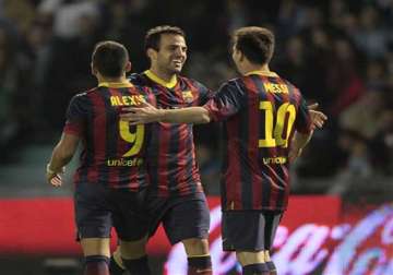 barcelona wins 3 0 at celta extends lead