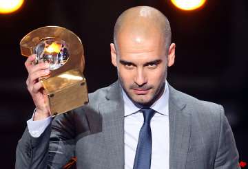barcelona s guardiola wins fifa best coach award