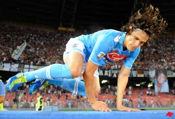 cavani hat trick leads napoli over ac milan