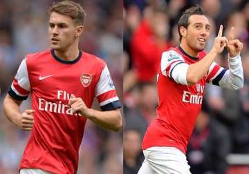 cazorla and ramsey sign new deals with arsenal
