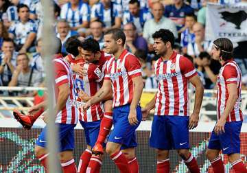 champions league atletico cruise into last 16