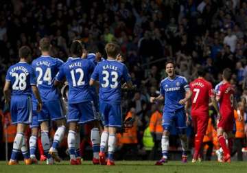 chelsea dents liverpool hopes with anfield win