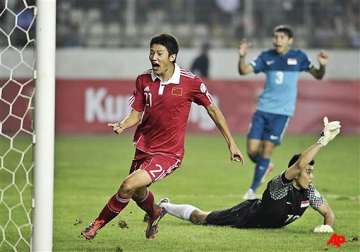 china rallies for 2 1 win over singapore