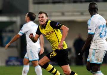 dortmund milan advance in champions league