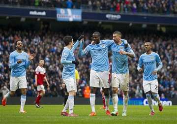 dzeko double helps man city to 3 0 win over man united in english premier league.