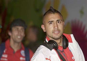 fifa world cup fit again vidal arrives in brazil with chile squad