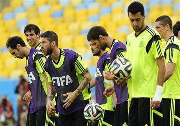 fifa world cup spain drops xavi pique for must win against chile