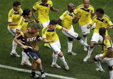fifa world cup colombia beat ivory coast 2 1 in a gripping world cup match