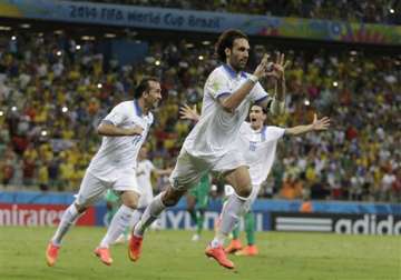 fifa world cup greece advances to next round after late penalty