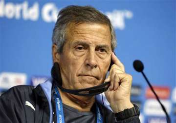 fifa world cup tabarez defends suarez against biting claims
