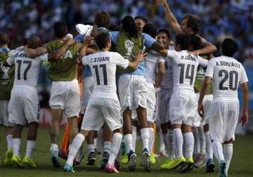 fifa world cup uruguay beats italy to advance greece late winner
