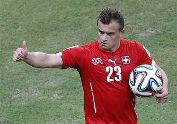 fifa world cup shaqiri s hat trick puts swiss into 2nd round