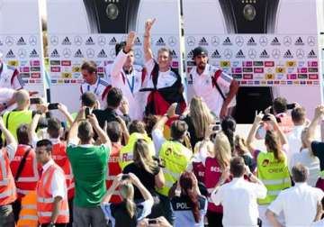 germany world cup heroes return to huge fan party