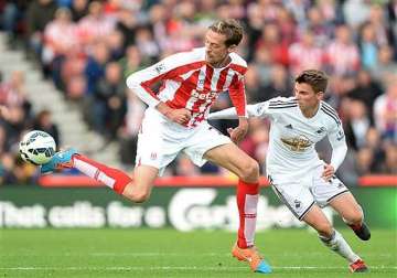 epl stoke comes from behind to beat swansea 2 1
