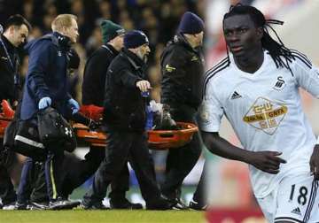 swansea striker gomis collapses during premier league match