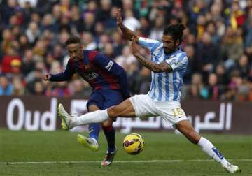 barcelona s winning streak ends with 1 0 home loss to malaga