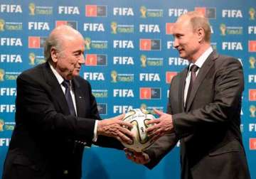 putin reassures blatter that russia can host 2018 world cup