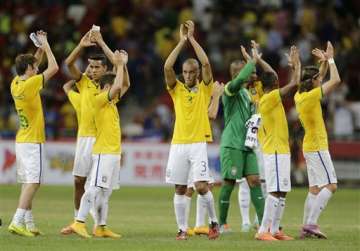 brazil players told not to wear hats earrings