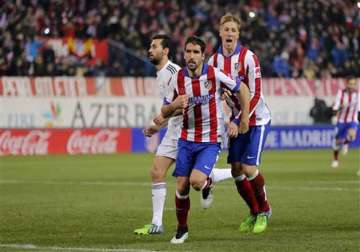atletico beats madrid 2 0 in copa as torres makes return
