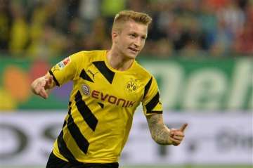 dortmund beats augsburg 3 2 for 1st bundesliga win