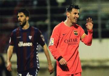 messi nets 31st 32nd league goals as barca protects lead