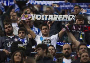 man dies 11 injured as spanish soccer fans clash