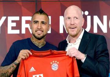 bayern munich signs chile midfielder arturo vidal