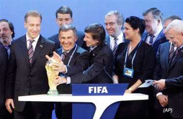 russia to host 2018 qatar to host 2022 world cup football