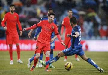 barcelona held 0 0 at getafe trails madrid by 4