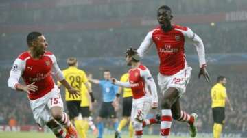arsenal through to champions league knockout phase