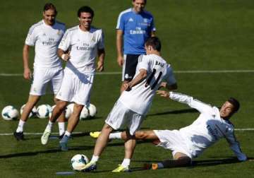 tough test in malaga for real madrid