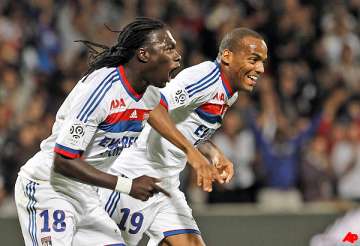 lyon beats marseille 2 0 to go top in france