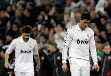 madrid follows barcelona in champions league exit
