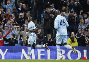 man city maintains title charge with newcastle win