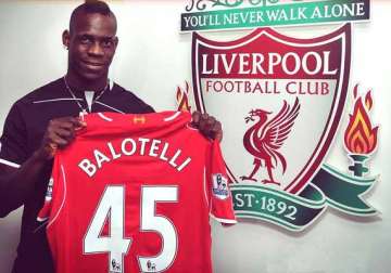 italy striker mario balotelli signs for liverpool