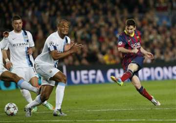 messi guides barca past city into champs