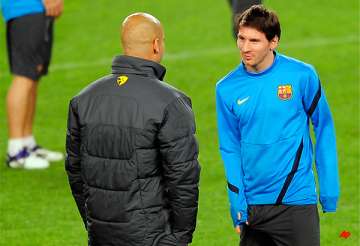 messi pays tribute to barcelona coach guardiola