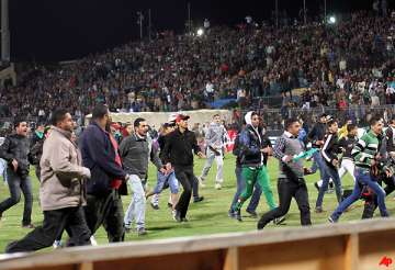 portuguese coach barely escapes egypt violence