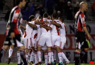 river wins opening game in second division