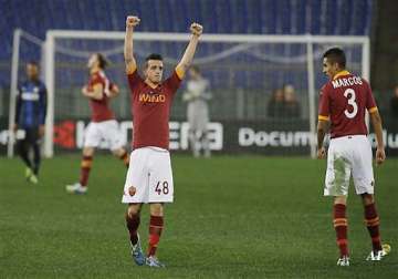 roma beats inter milan in 1st leg of italian cup semi