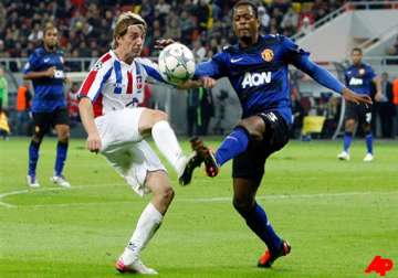 rooney penalties rescue united in champions league