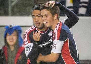 rowe helps revolution beat fire