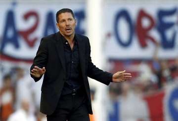 simeone takes over at racing club in argentina