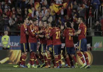 spain a point away from world cup qualification