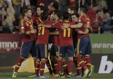 spain beats belarus 1 point away from world cup