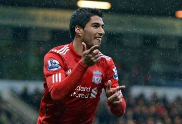 suarez scores from near halfway for hat trick